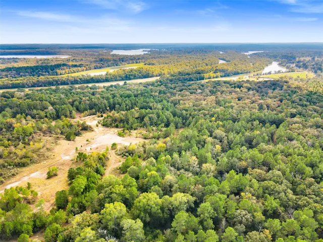 a view of a swimming pool with an outdoor space and seating area