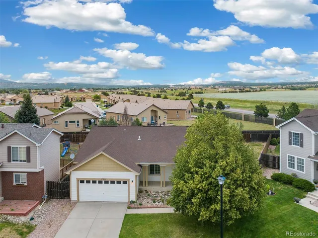 a view of a city with a building in the background