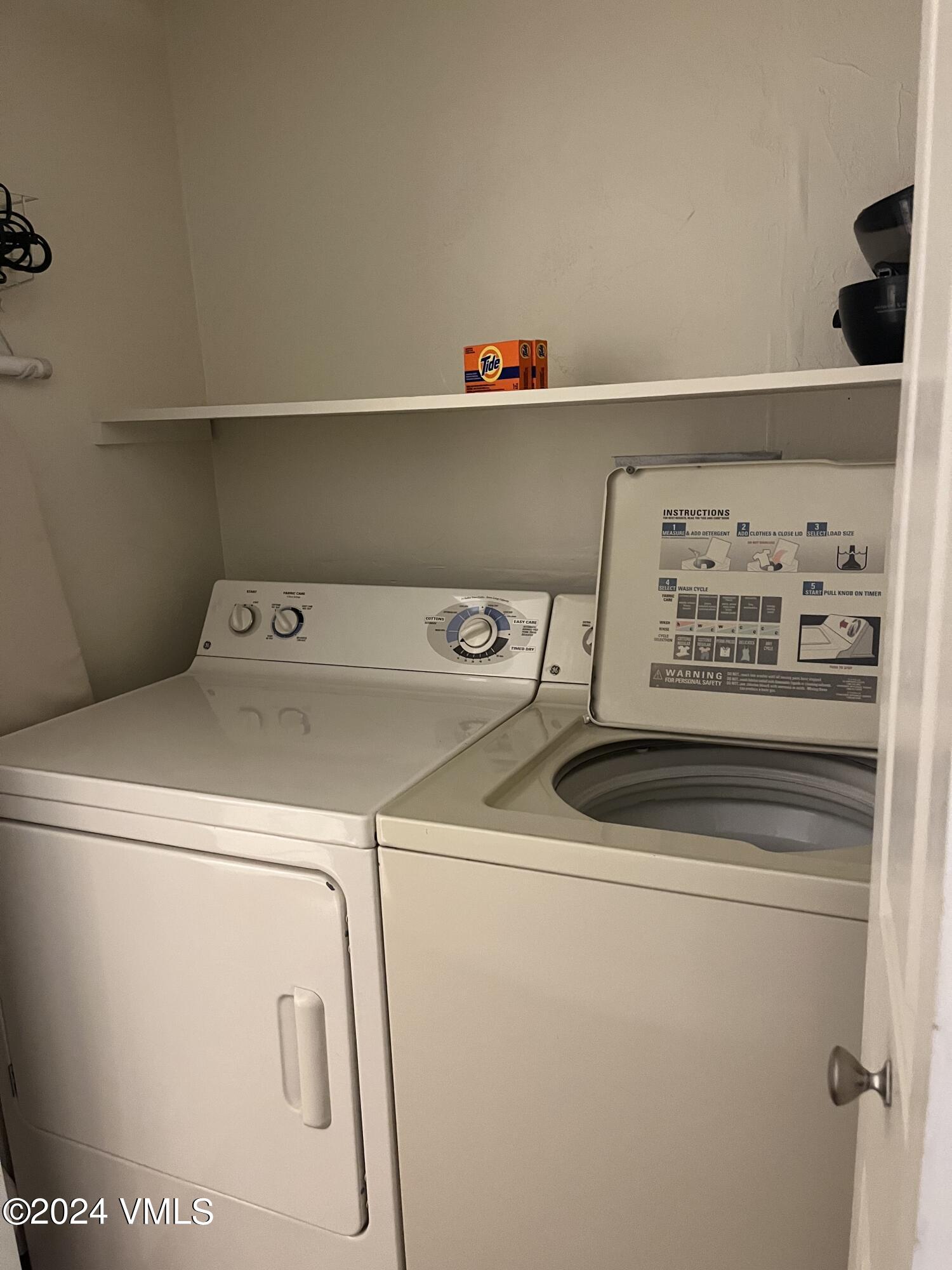 1020 Vail View Drive, Unit 320832 Vail, CO 81657 - Photo 11 of 12 a utility room with dryer and washer