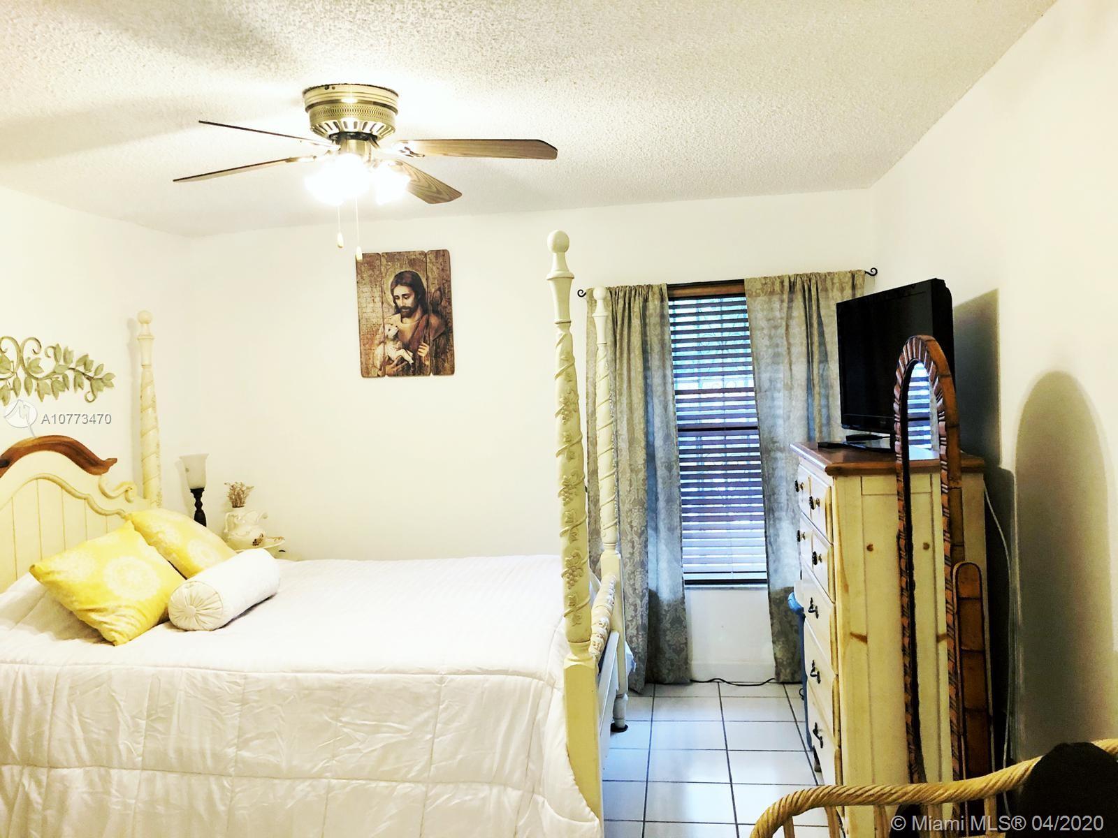 8000 Southwest 153rd Place Miami, FL 33193 - Photo 15 of 28 MASTER BEDROOM
