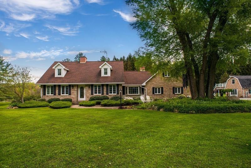 a view of a house with garden