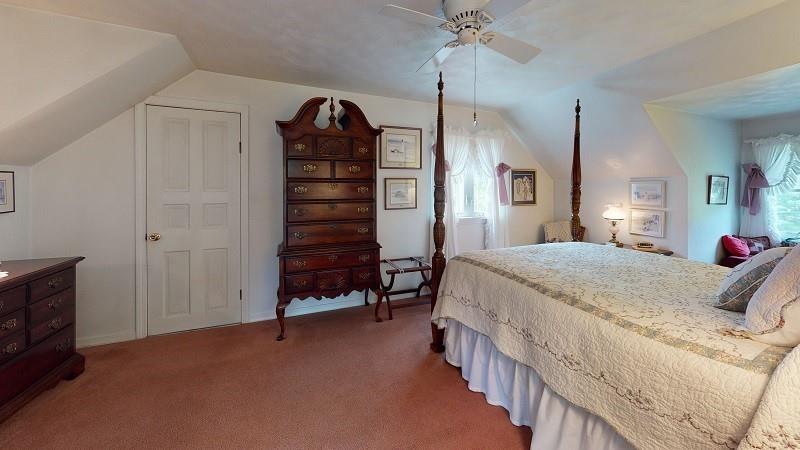 23982 Middle Road Cambridge Springs, PA 16403 - Photo 13 of 25 a bed room with a bed and a television