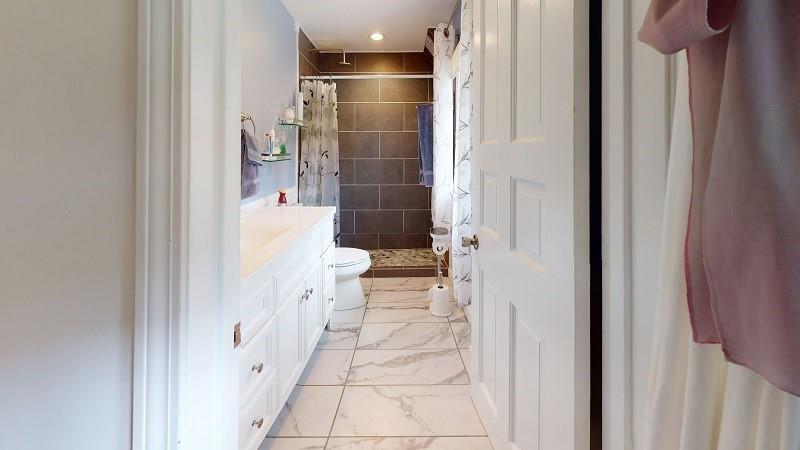 23982 Middle Road Cambridge Springs, PA 16403 - Photo 14 of 25 a bathroom with a glass shower door