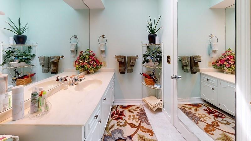 23982 Middle Road Cambridge Springs, PA 16403 - Photo 17 of 25 a bathroom with a sink mirror and vanity