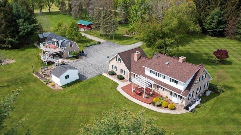 23982 Middle Road Cambridge Springs, PA 16403 - Photo 23 of 25 an aerial view of a house with garden space and street view