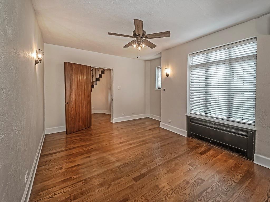 1035 Washington Road Pittsburgh, PA 15228 - Photo 12 of 44 wooden floor in an empty room with a window