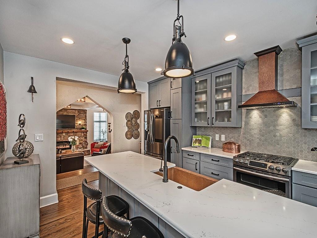 1035 Washington Road Pittsburgh, PA 15228 - Photo 16 of 44 a kitchen with stainless steel appliances a sink and a stove