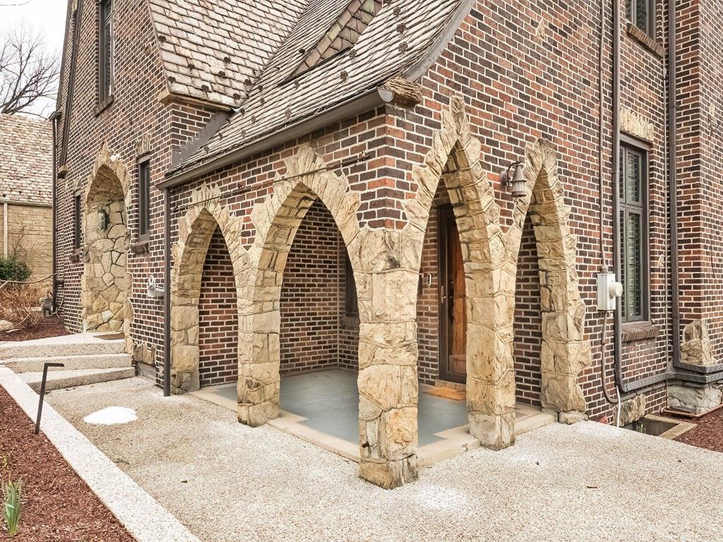 1035 Washington Road Pittsburgh, PA 15228 - Photo 2 of 44 a view of a brick house with many windows