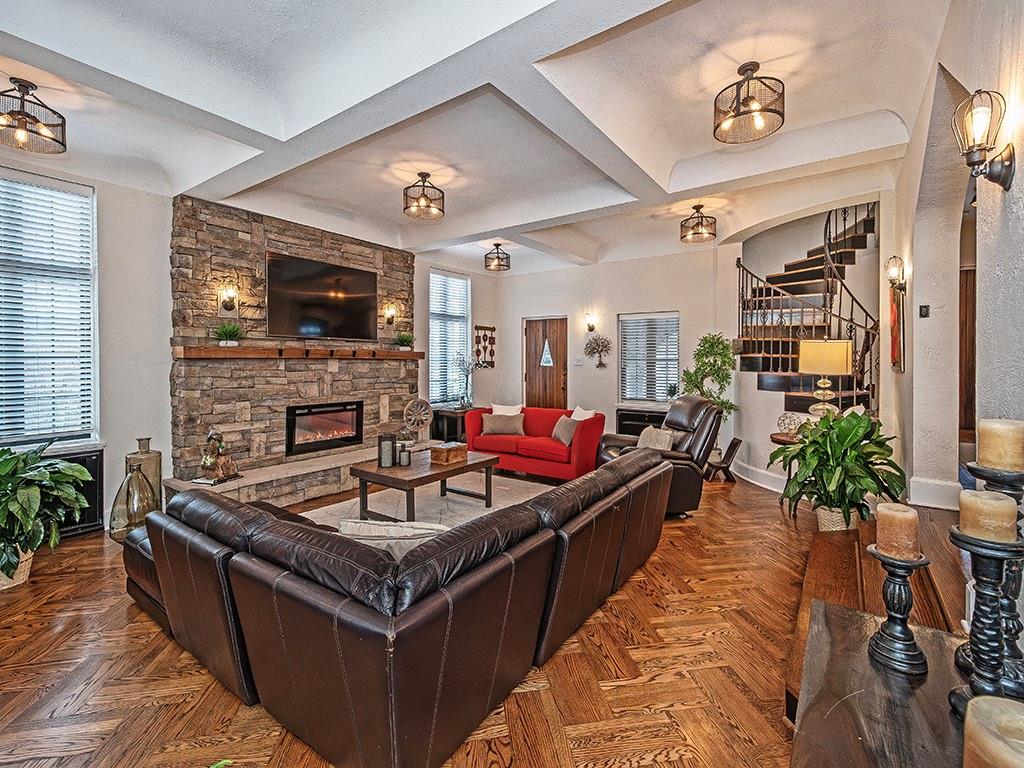 1035 Washington Road Pittsburgh, PA 15228 - Photo 5 of 44 a living room with furniture a flat screen tv and a fireplace