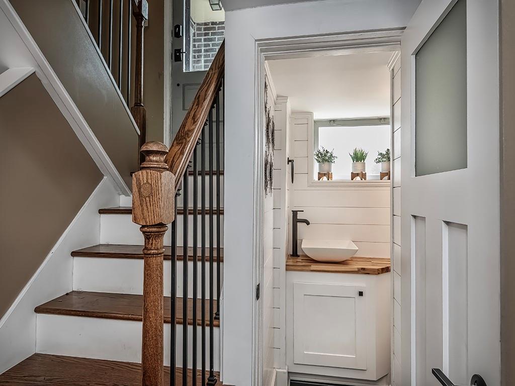 1035 Washington Road Pittsburgh, PA 15228 - Photo 8 of 44 a view of a hallway with wooden floor and staircase