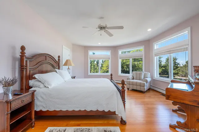 a bedroom with furniture and window