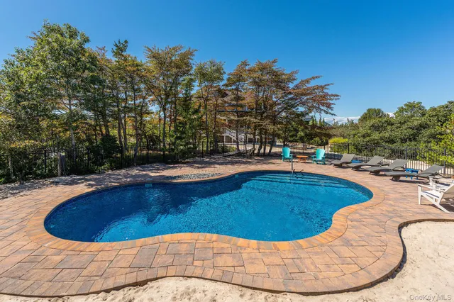 a view of a balcony with wooden floor