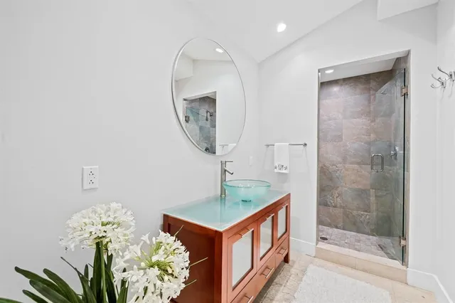 a room with table and a mirror