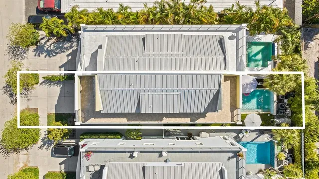 a view of a backyard with a table and chair