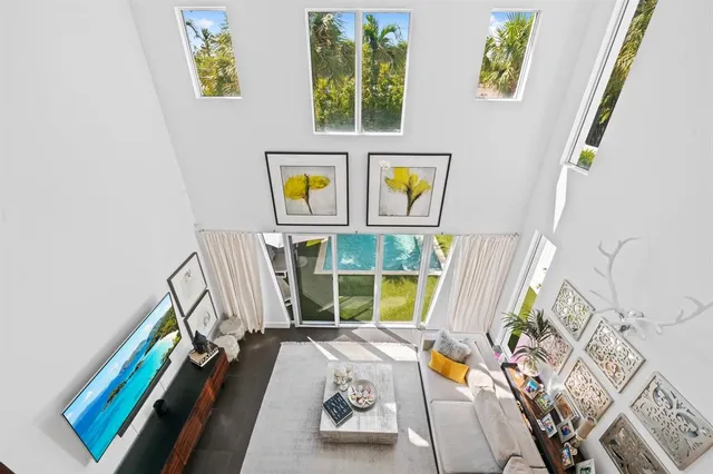 kids bedroom with two beds and a window