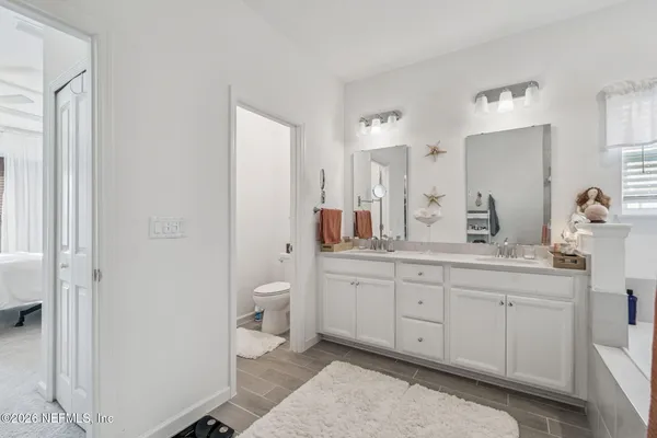 a kitchen with stainless steel appliances kitchen island granite countertop a sink and cabinets