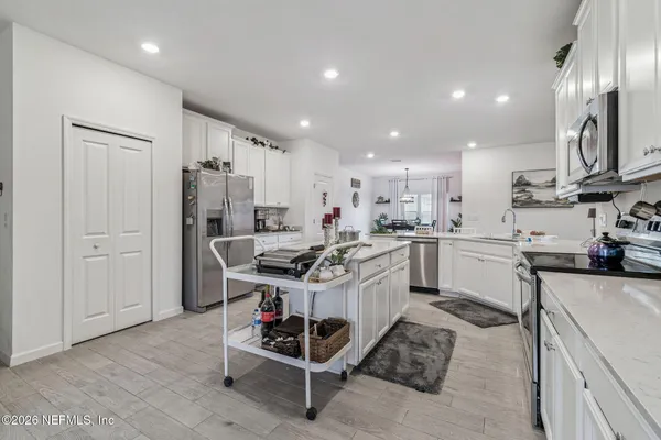 a view of a dining room with furniture
