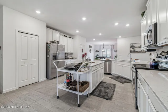 a view of a dining room with furniture