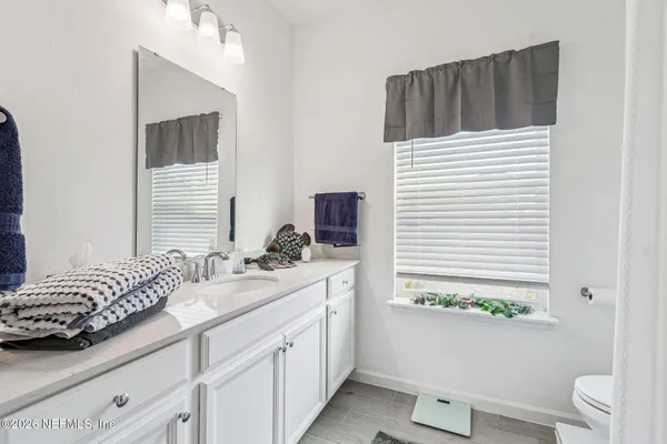 a room with cabinets and furniture