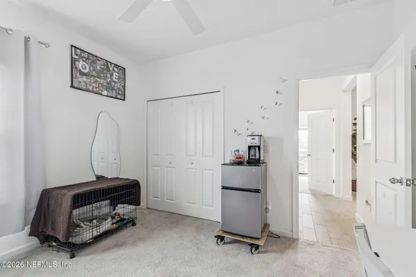 an aerial view of house with yard swimming pool and outdoor seating