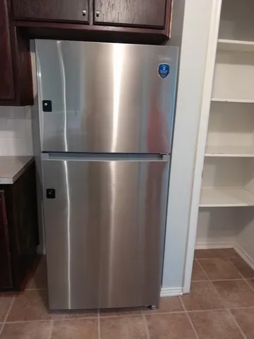 a close view of a refrigerator in kitchen