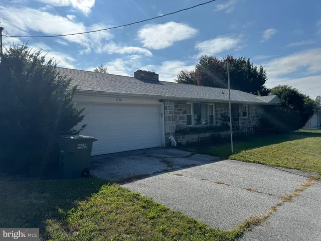 a view of backyard with green space