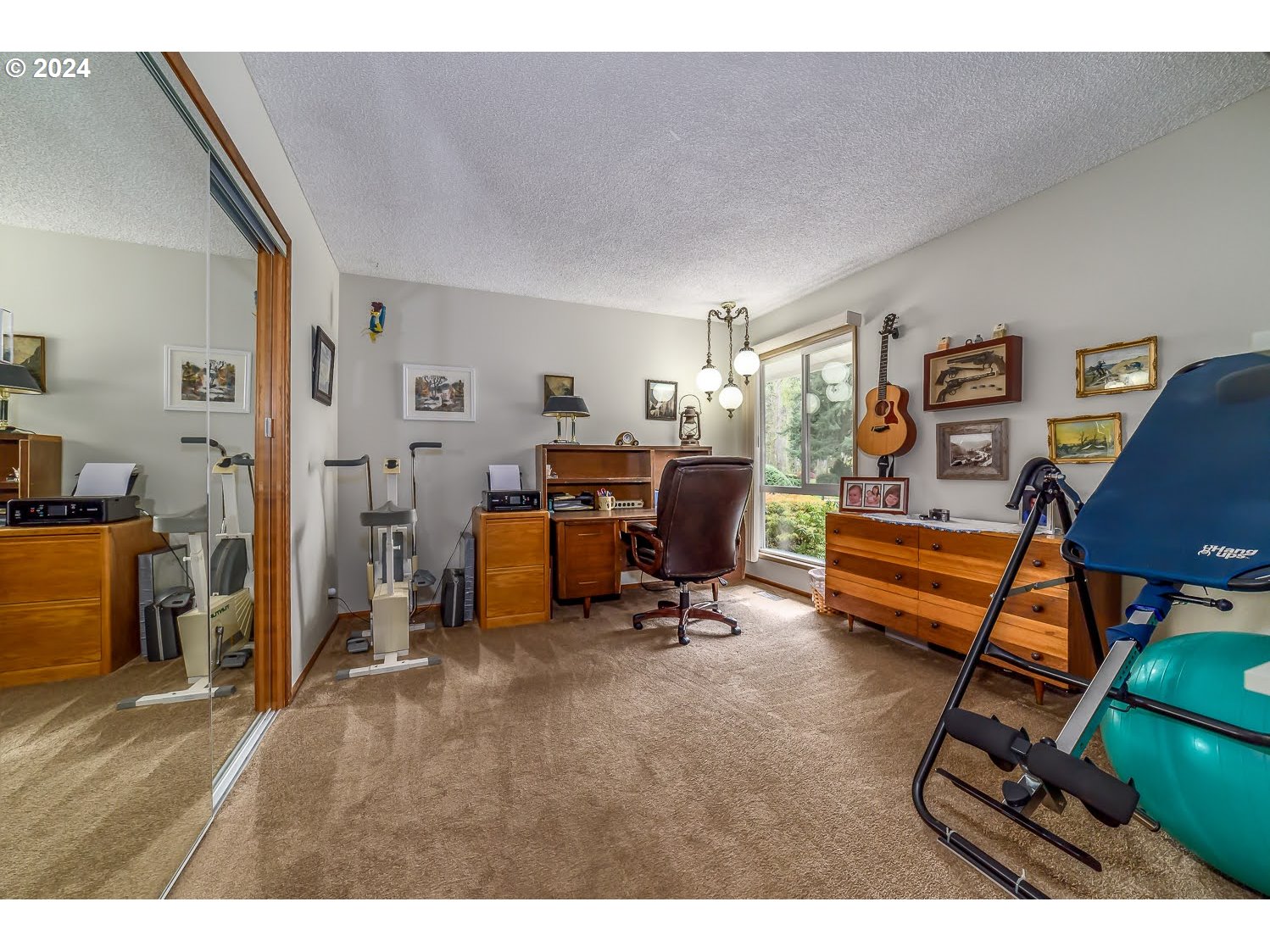 40157 York Lane Springfield, OR 97478 - Photo 23 of 41 a bedroom with furniture and a wooden floor