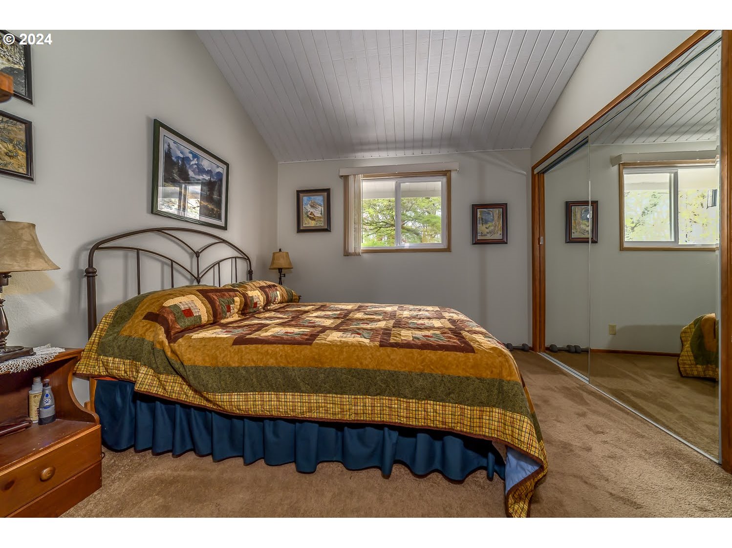 40157 York Lane Springfield, OR 97478 - Photo 25 of 41 a bedroom with a bed and a wall painting