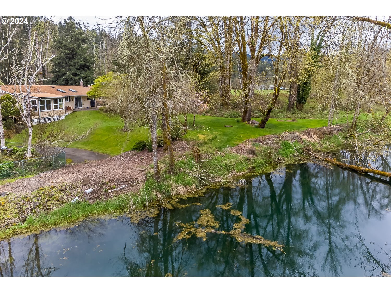 40157 York Lane Springfield, OR 97478 - Photo 37 of 41 a view of a house with a yard