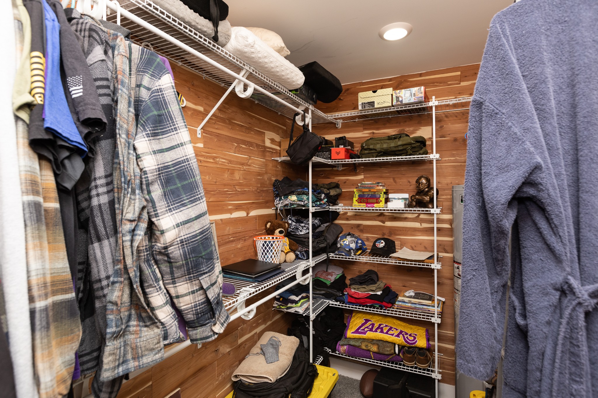 8884 Bethel Road Prospect, TN 38477 - Photo 29 of 41 a view of walk in closet with clothes and shoes