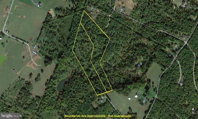 an aerial view of a residential houses