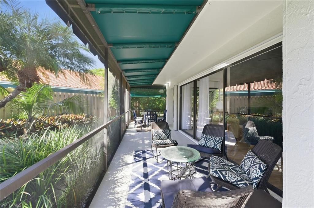 772 Reef Point Circle Naples, FL 34108 - Photo 23 of 46 a outdoor space with furniture