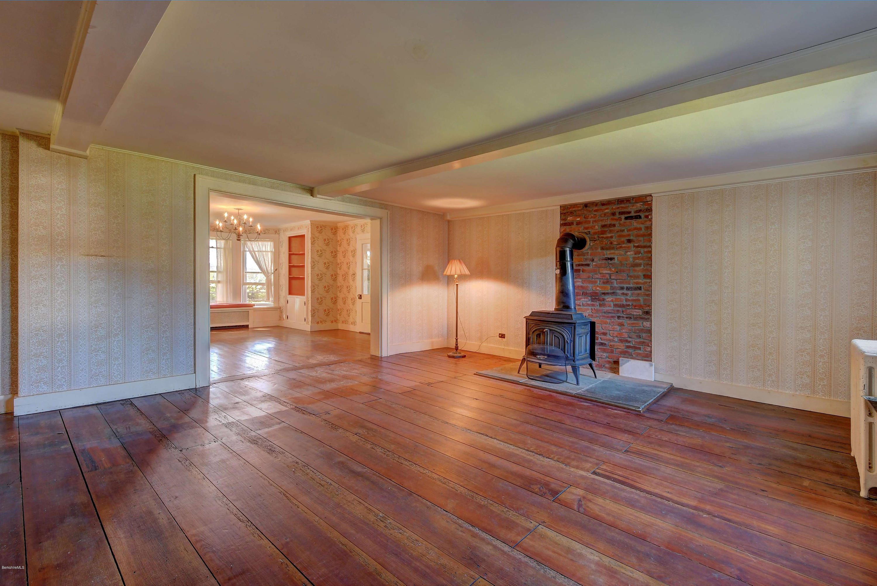 1299 Rannapo Road Sheffield, MA 01222 - Photo 15 of 39 Living Room to dining room