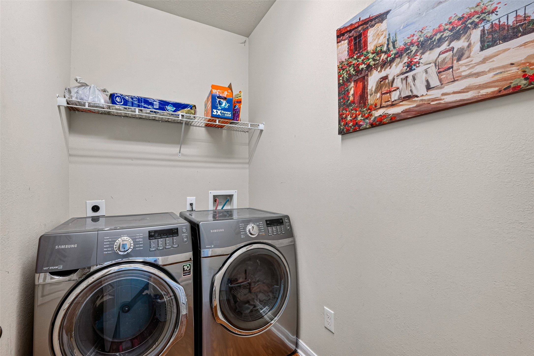 9314 Fuqua Ridge Lane Houston, TX 77075 - Photo 12 of 24 a utility room with dryer and washer
