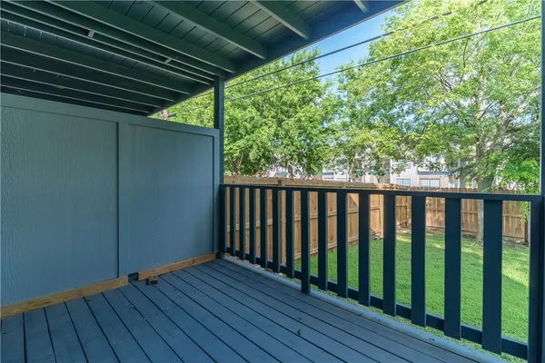 a view of backyard with green space