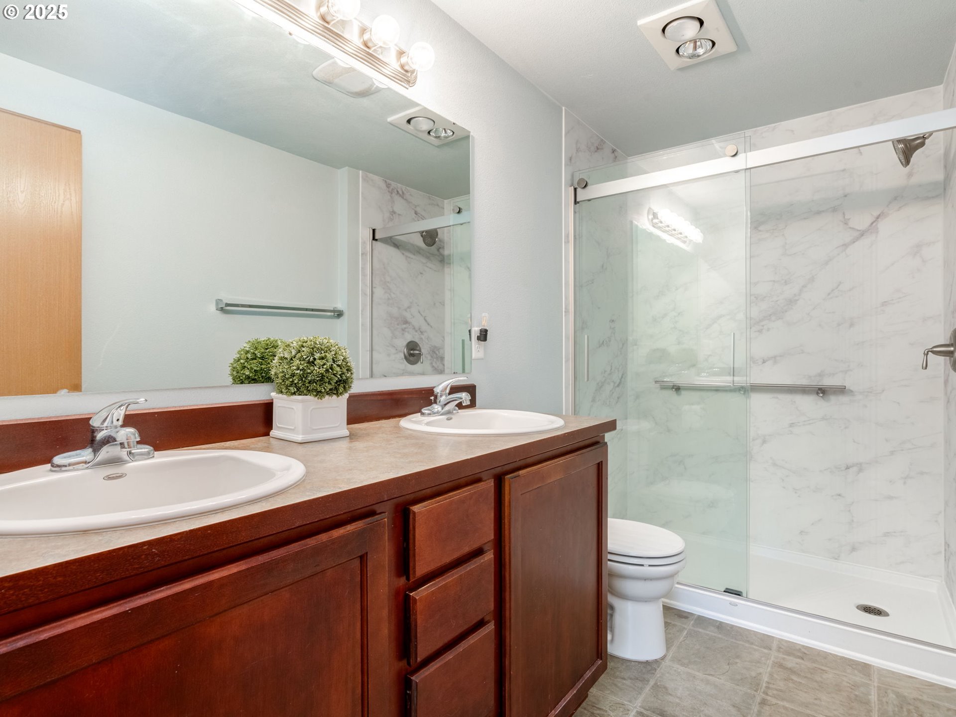 7575 Birch Street Grand Ronde, OR 97347 - Photo 23 of 48 a bathroom with a sink a toilet and shower