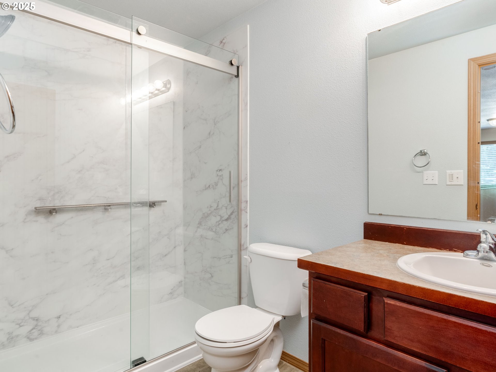 7575 Birch Street Grand Ronde, OR 97347 - Photo 28 of 48 a bathroom with a sink a toilet and shower