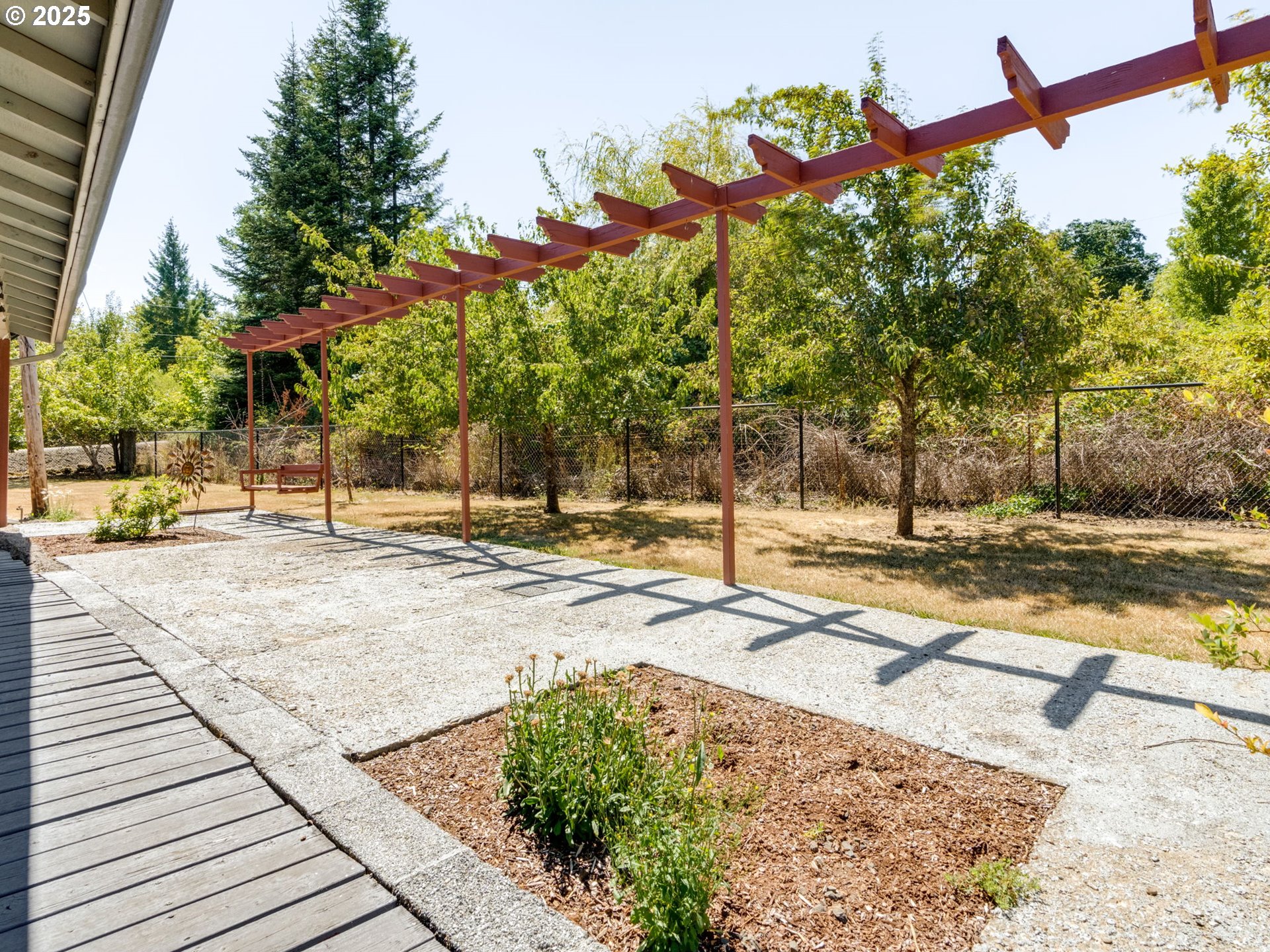 7575 Birch Street Grand Ronde, OR 97347 - Photo 31 of 48 a view of a yard with cars