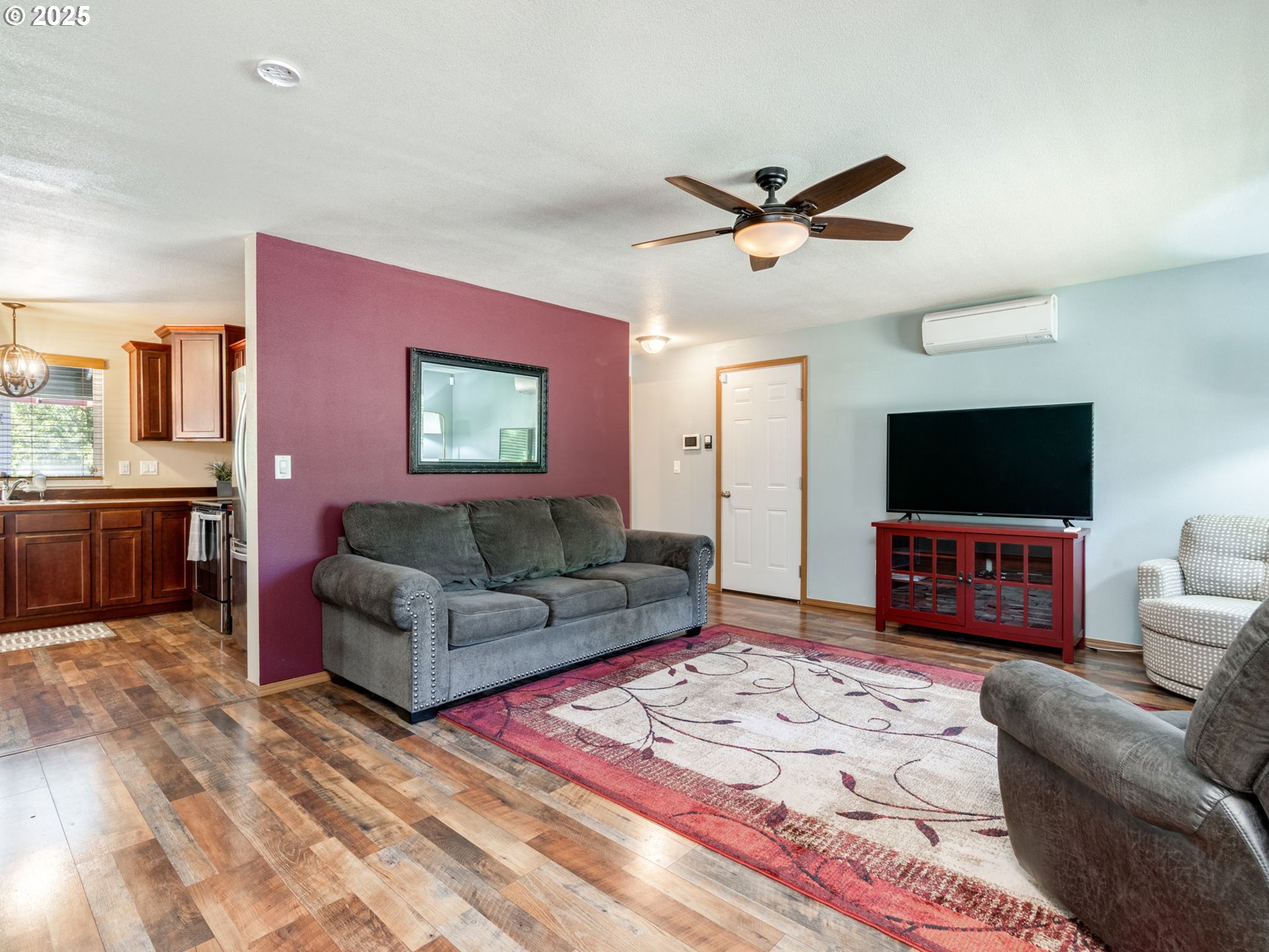 7575 Birch Street Grand Ronde, OR 97347 - Photo 8 of 48 a living room with furniture and a flat screen tv
