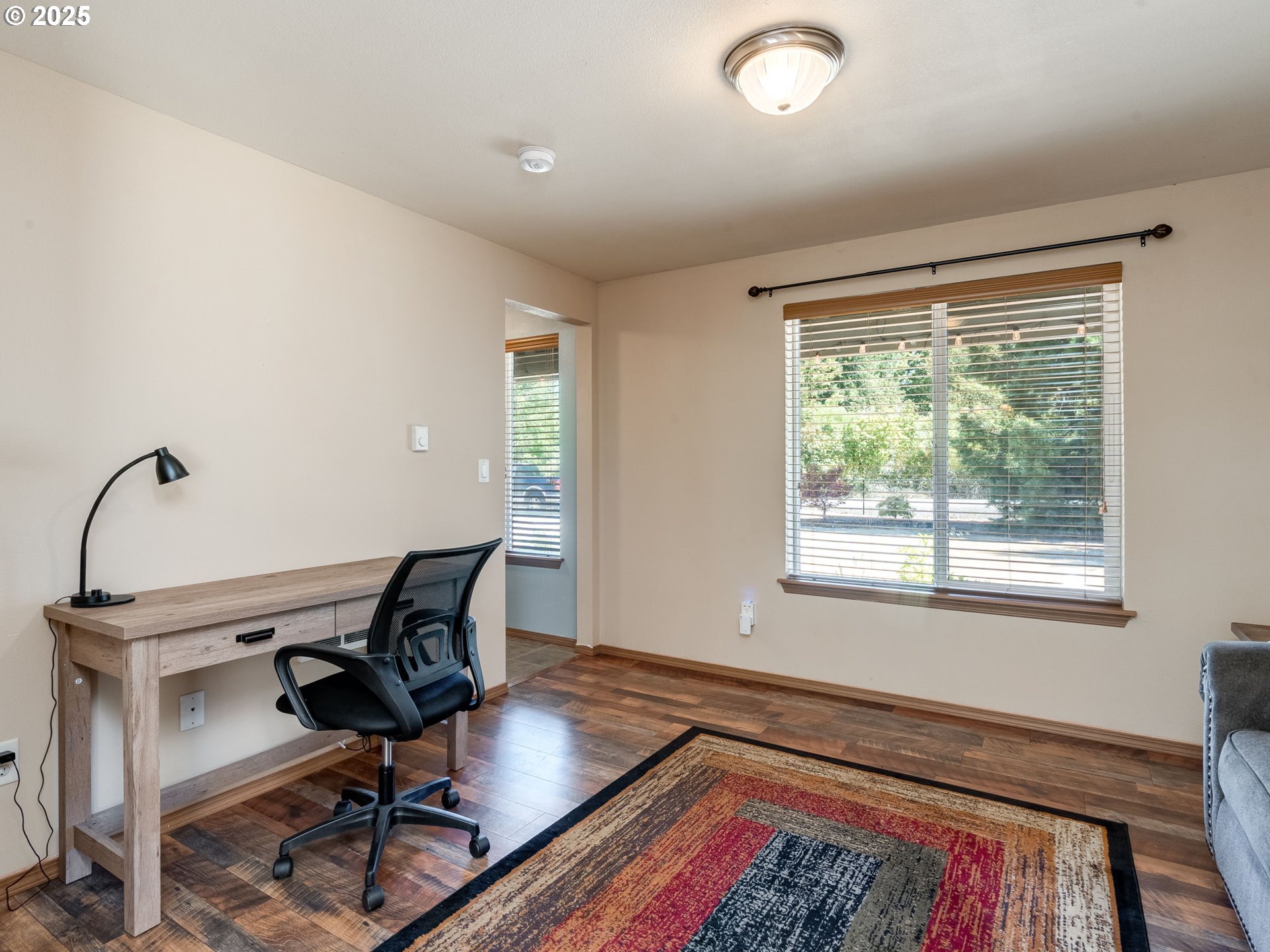 7575 Birch Street Grand Ronde, OR 97347 - Photo 10 of 48 a living room with furniture and a rug
