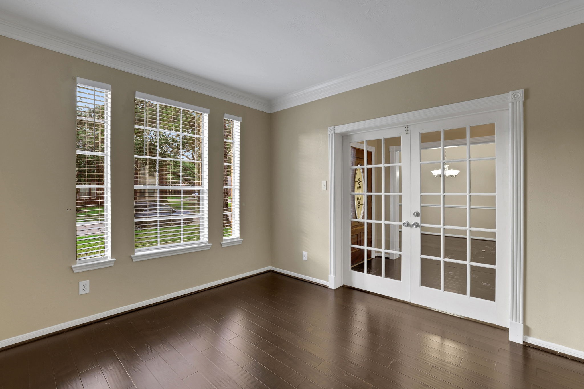 23207 Olive Ridge Court Katy, TX 77494 - Photo 6 of 46 a view of empty room with wooden floor and windows
