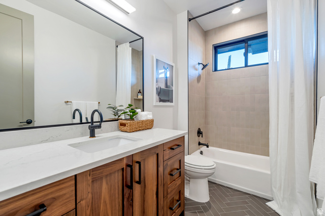 2145 North Main Street Centerville, UT 84014 - Photo 28 of 53 Bathroom featuring vanity and shower / tub combo with curtain