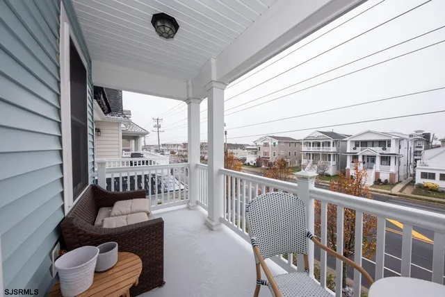 a view of a balcony with chair