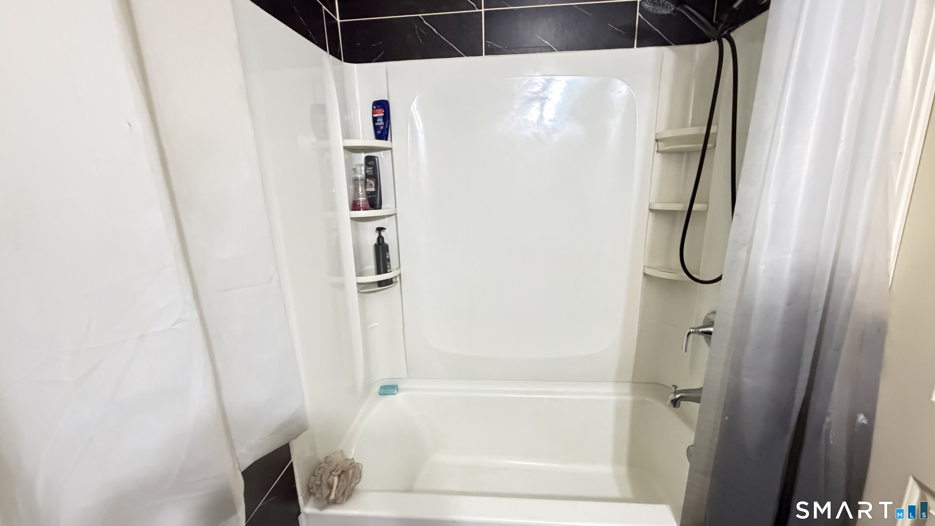 646 Howe Avenue, Unit 23 Shelton, CT 06484 - Photo 18 of 33 a bathroom with a shower
