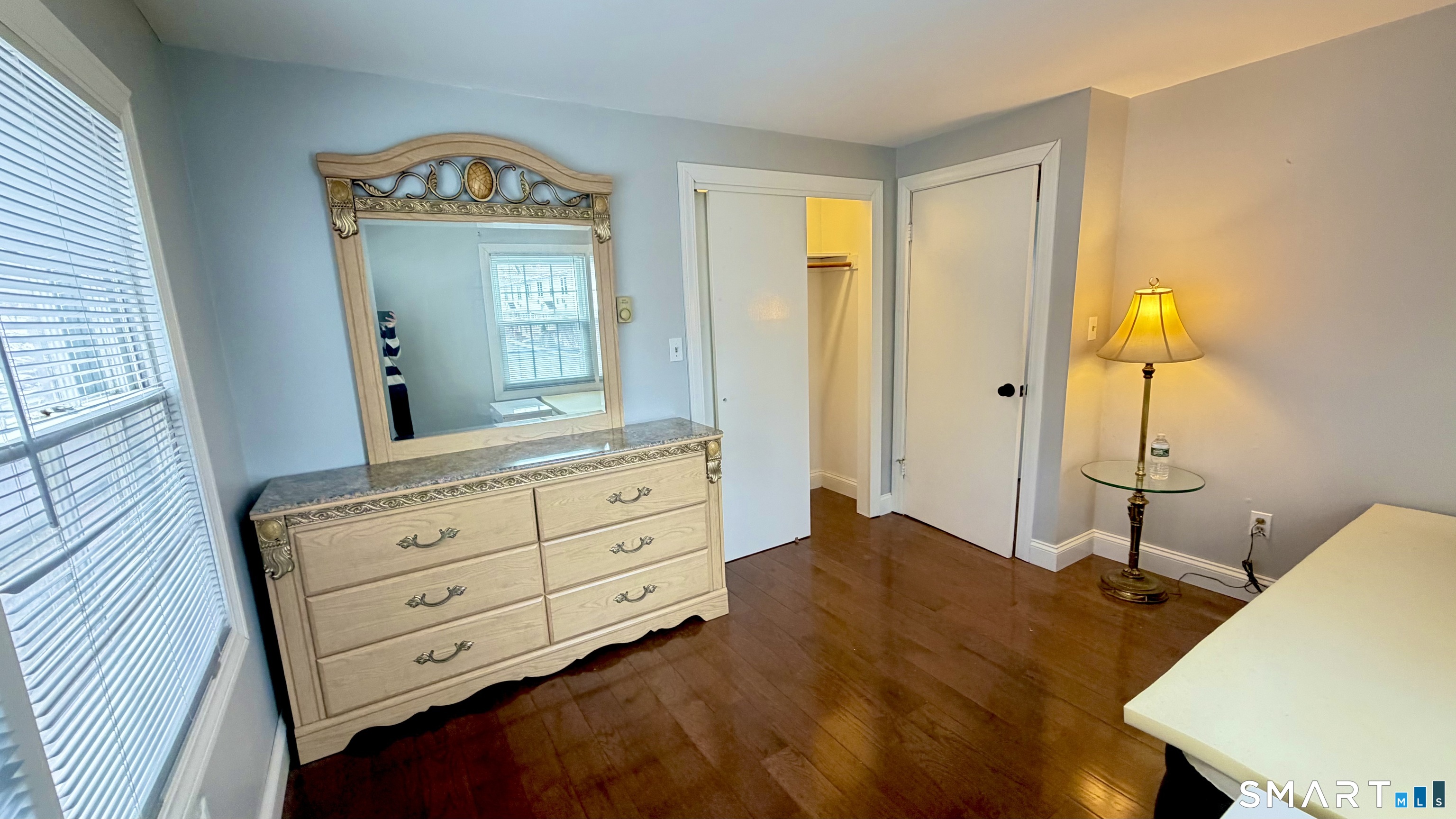 646 Howe Avenue, Unit 23 Shelton, CT 06484 - Photo 19 of 33 a bedroom with a bed and a dresser in it