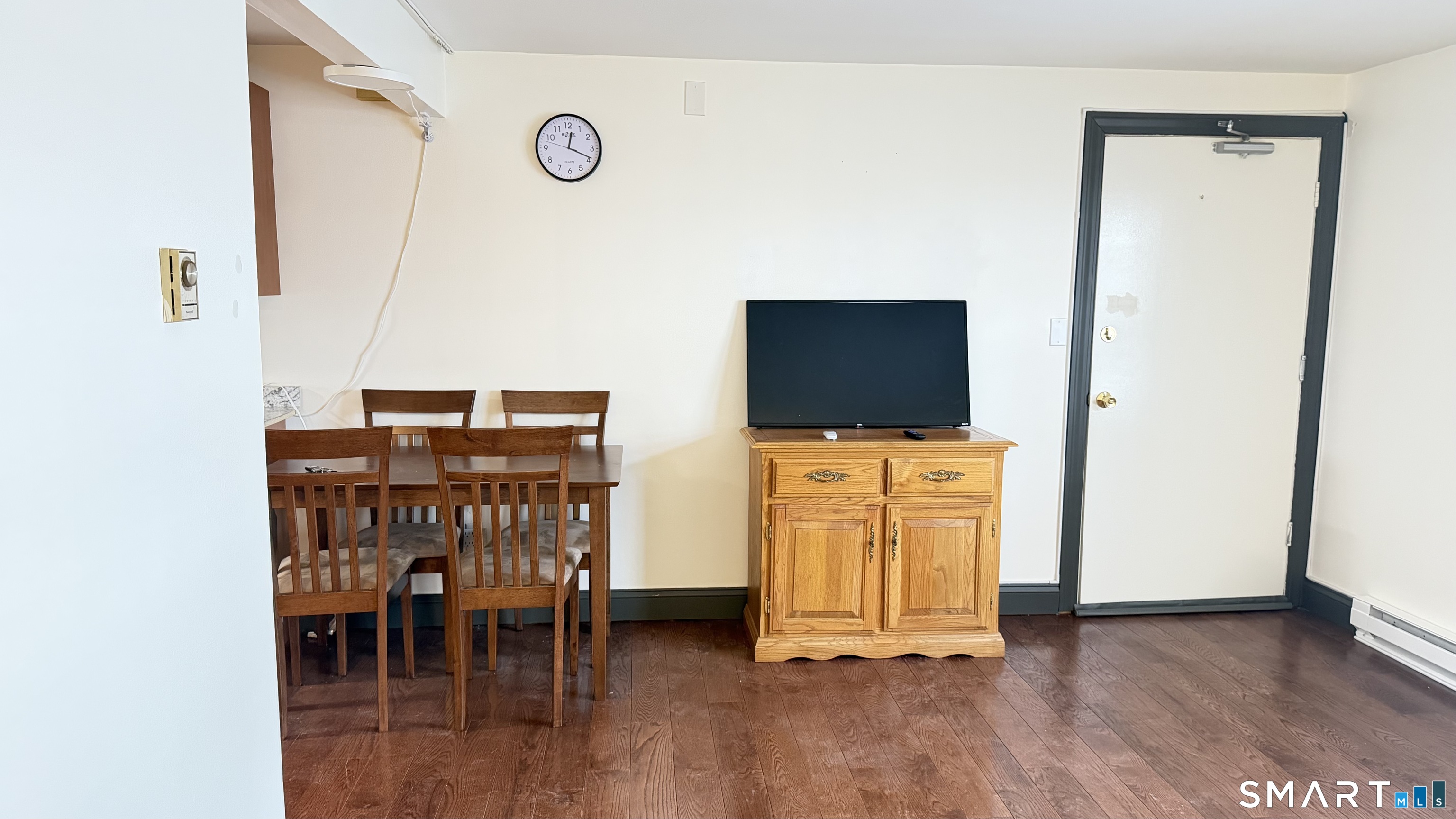 646 Howe Avenue, Unit 23 Shelton, CT 06484 - Photo 5 of 33 a view of kitchen with furniture and wooden floor