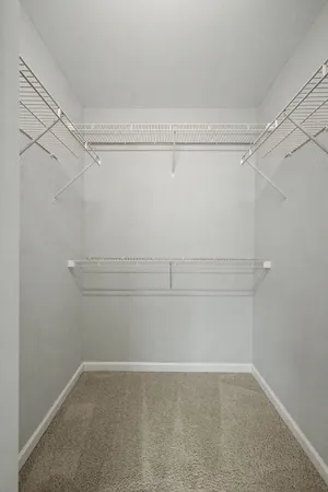 a view of a room with racks on the wall