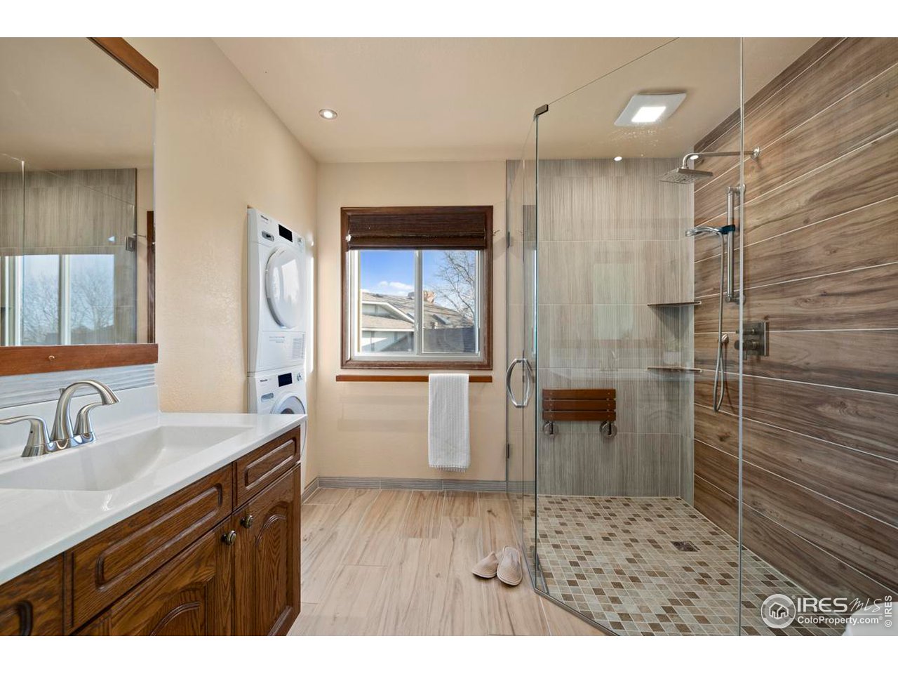 2713 Beech Way Longmont, CO 80503 - Photo 22 of 36 a bathroom with a sink a toilet and shower