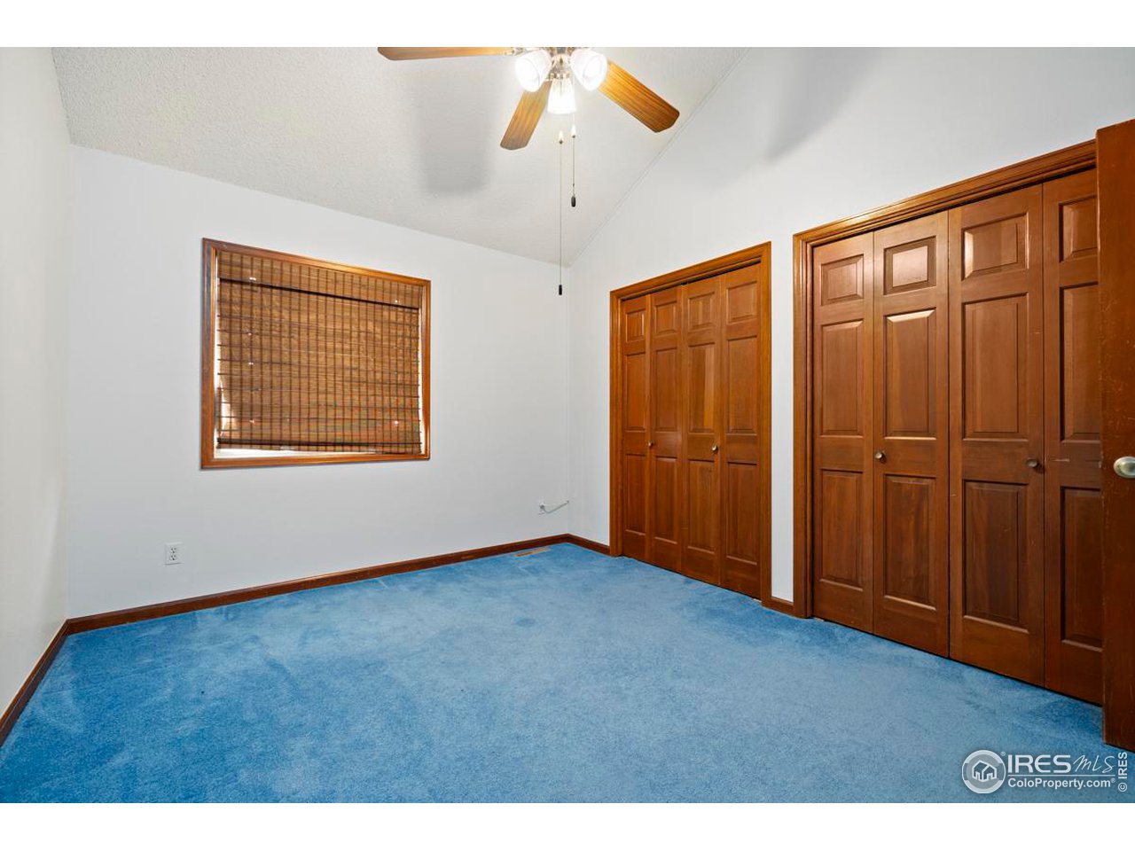 2713 Beech Way Longmont, CO 80503 - Photo 25 of 36 a view of an empty room with a window