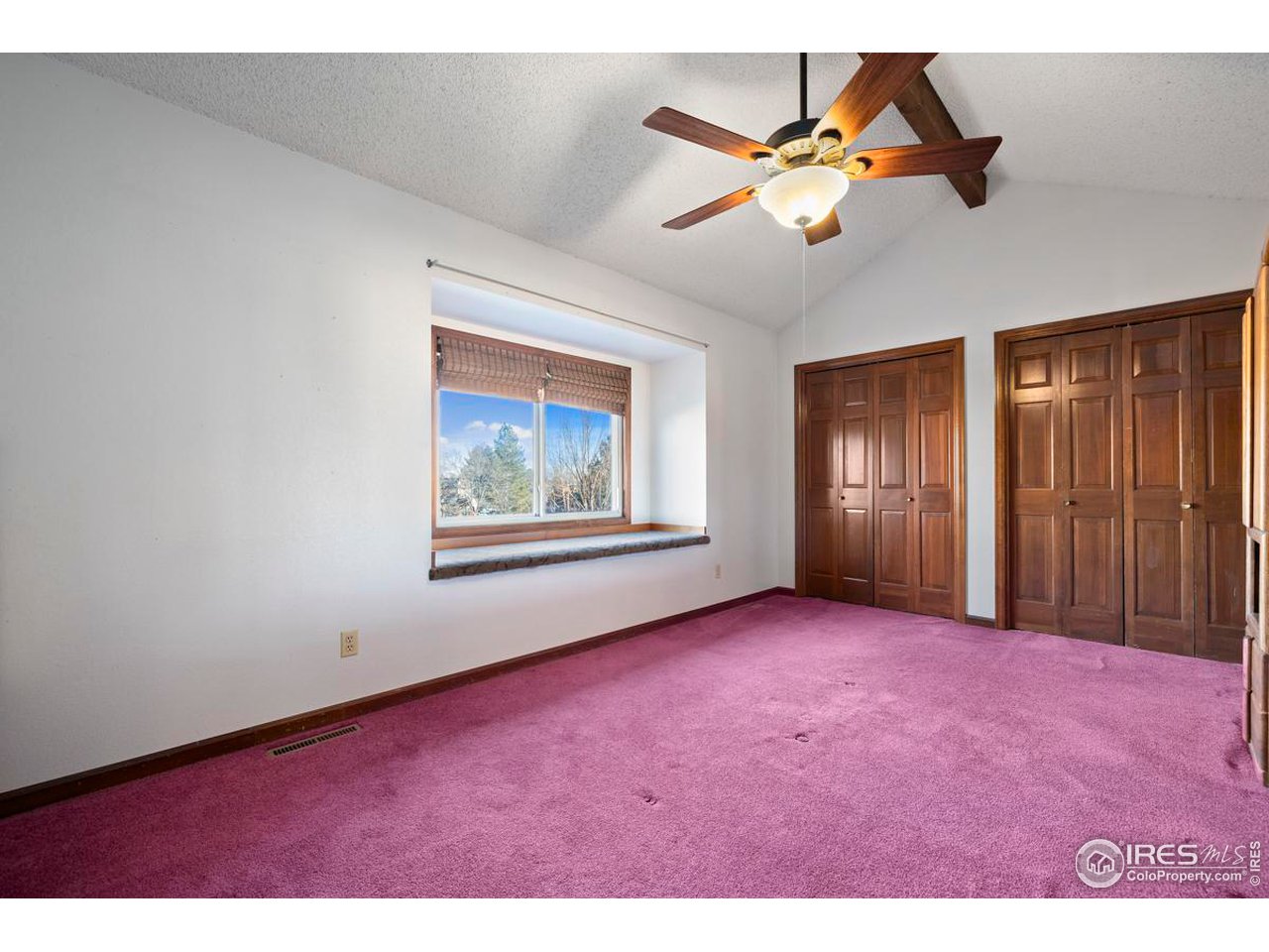 2713 Beech Way Longmont, CO 80503 - Photo 26 of 36 a view of an empty room with window